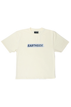 Beige t-shirt with 'EARTHSIDE' logo on a white background