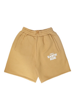 Beige shorts with text on a white background