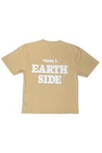Beige t-shirt with 'verse L. Earth Side' text on the back against a white background