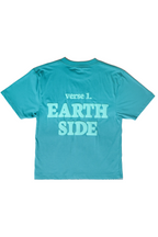 Turquoise t-shirt with 'verse 1 EARTH SIDE' text on a white background